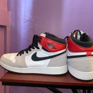 Jordan 1 Mid Light Smoke Grey in a size 6.5 Y